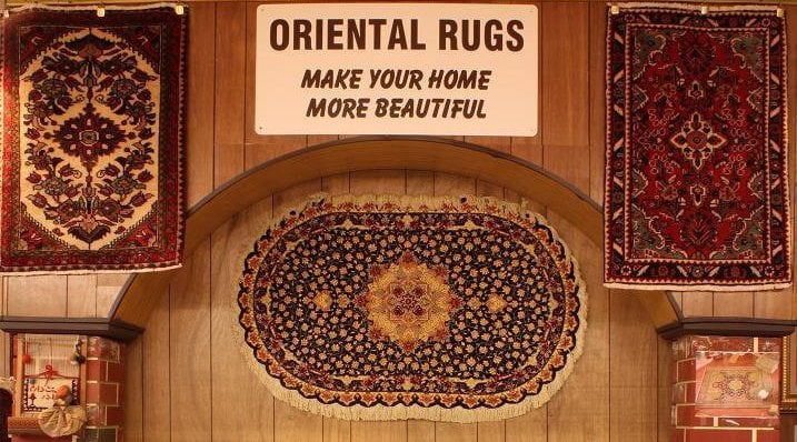 oriental rugs hanging on wall